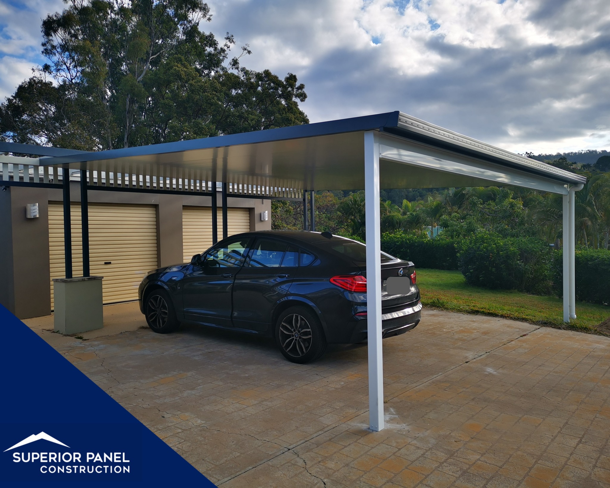 Completed freestanding vehicle carport