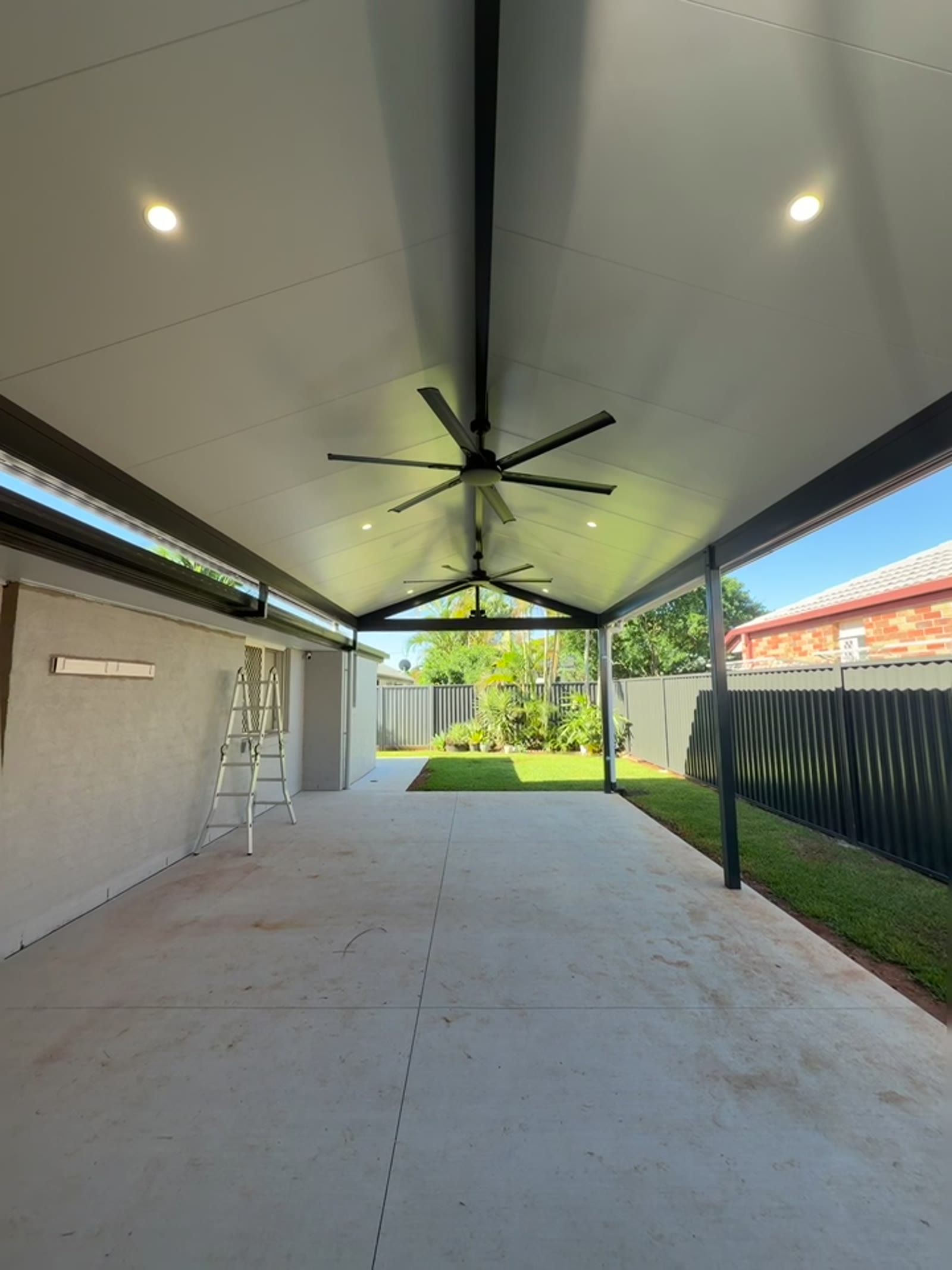 Covered residential patio completed by Samlock